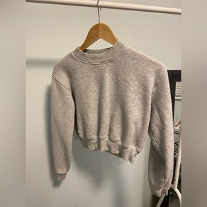 Aritzia TNA cropped crew neck sweater in a size XS